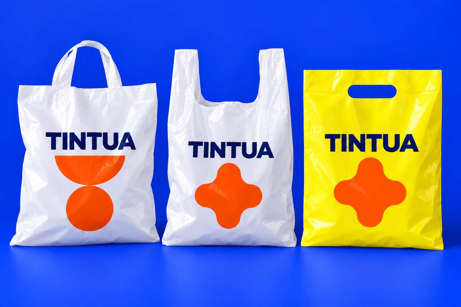Apresentação ilustrativa TINTUA com sacolas de boca triste, alça camiseta e alça fita